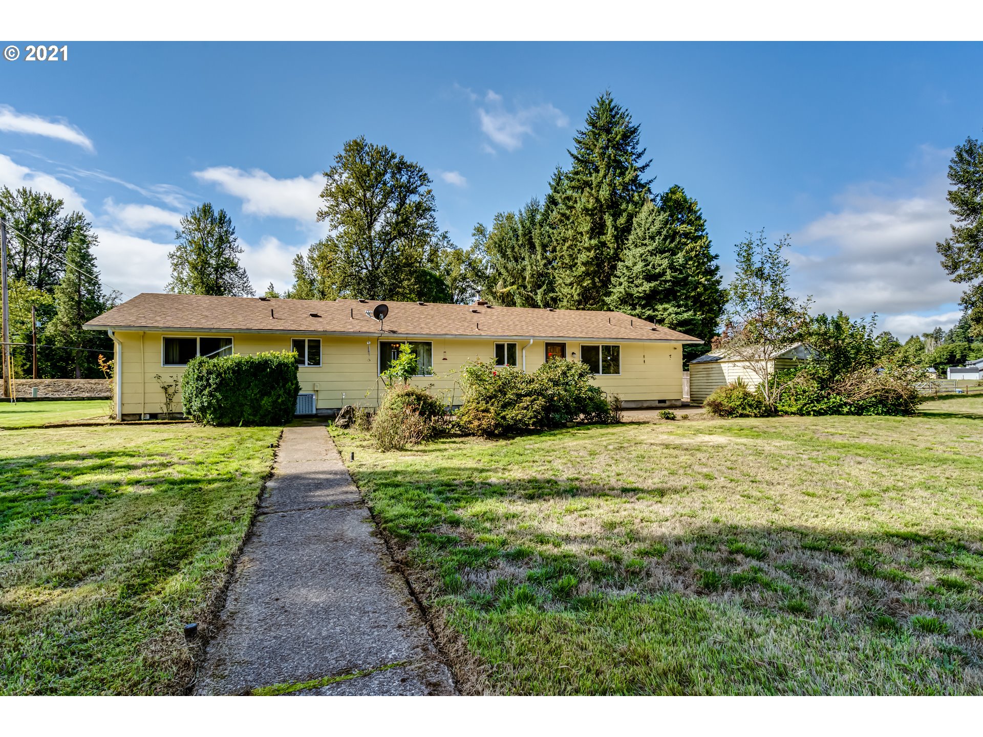 37771 Camp Creek Road Springfield, OR 97478 - Photo 23 of 30 a front view of a house with a yard