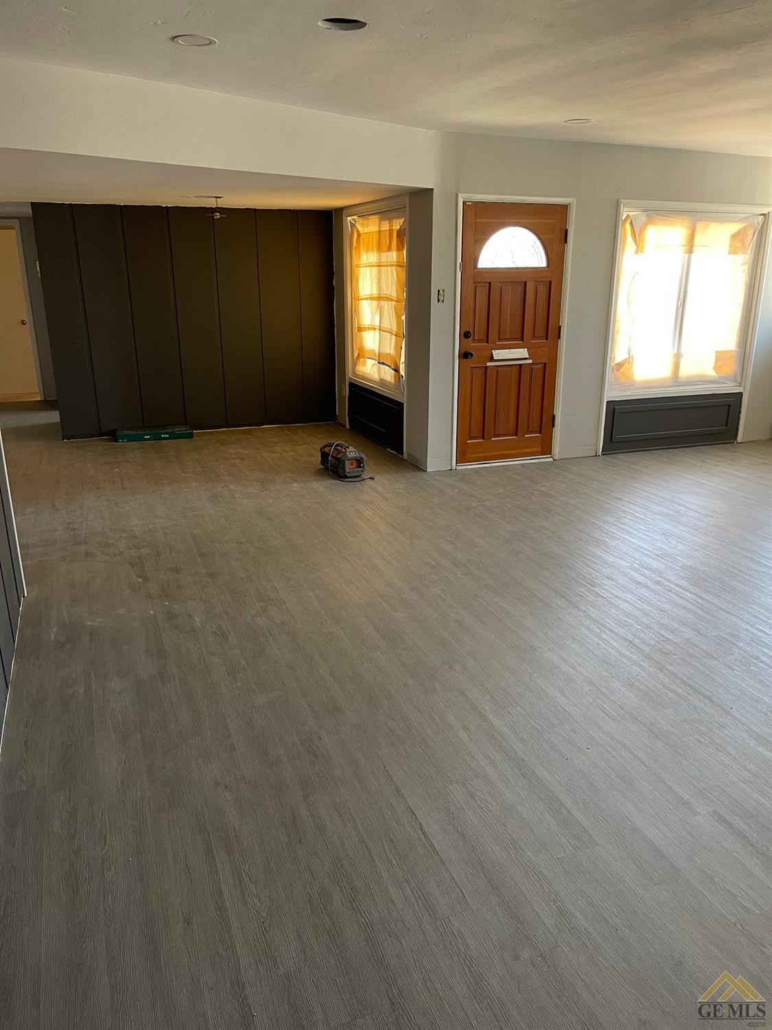 Undisclosed Address Bakersfield, CA 93306 - Photo 2 of 3 an empty room with windows