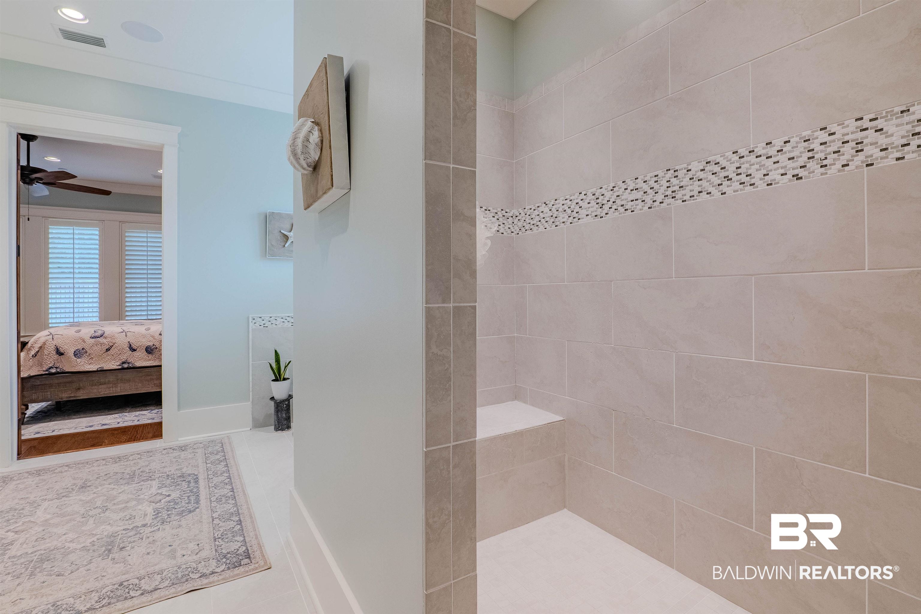 708 Manning Place Fairhope, AL 36532 - Photo 29 of 58 Bathroom with ceiling fan and tiled shower