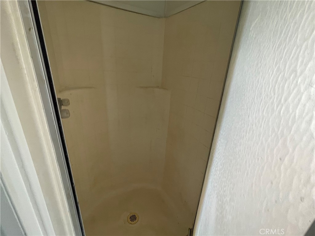 18600 Chippewa Road Lake Elsinore, CA 92532 - Photo 10 of 18 a bathroom with a shower