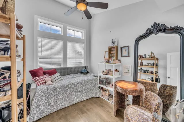 a bedroom with furniture and a bed