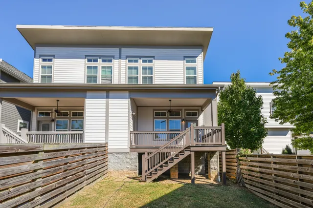 a front view of house with a yard