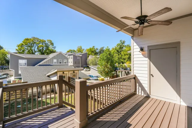 a view of a balcony with a potted plant