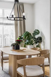 a view of a dining room with furniture