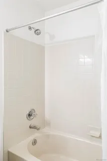 a front view of a house with many windows