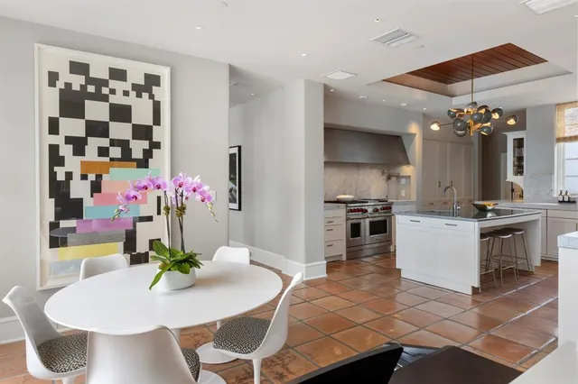 a work room with furniture and wooden floor