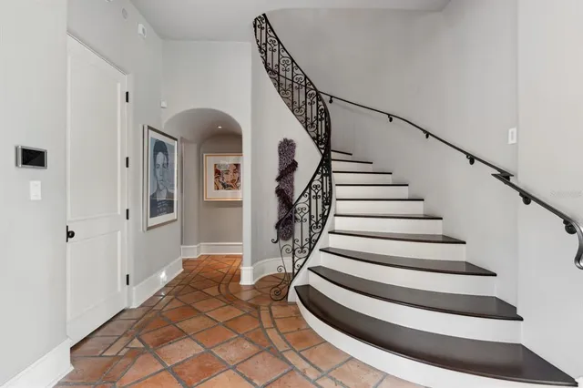 a bathroom with a sink a vanity and a large mirror