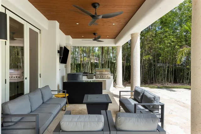 a view of a swimming pool and lounge chair