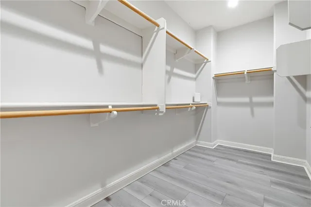 a view of an empty walk in closet
