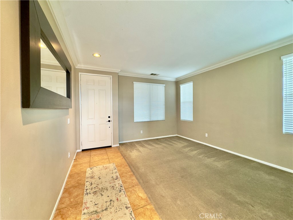 11265 Runyan Road Beaumont, CA 92223 - Photo 25 of 138 a view of an empty room and window