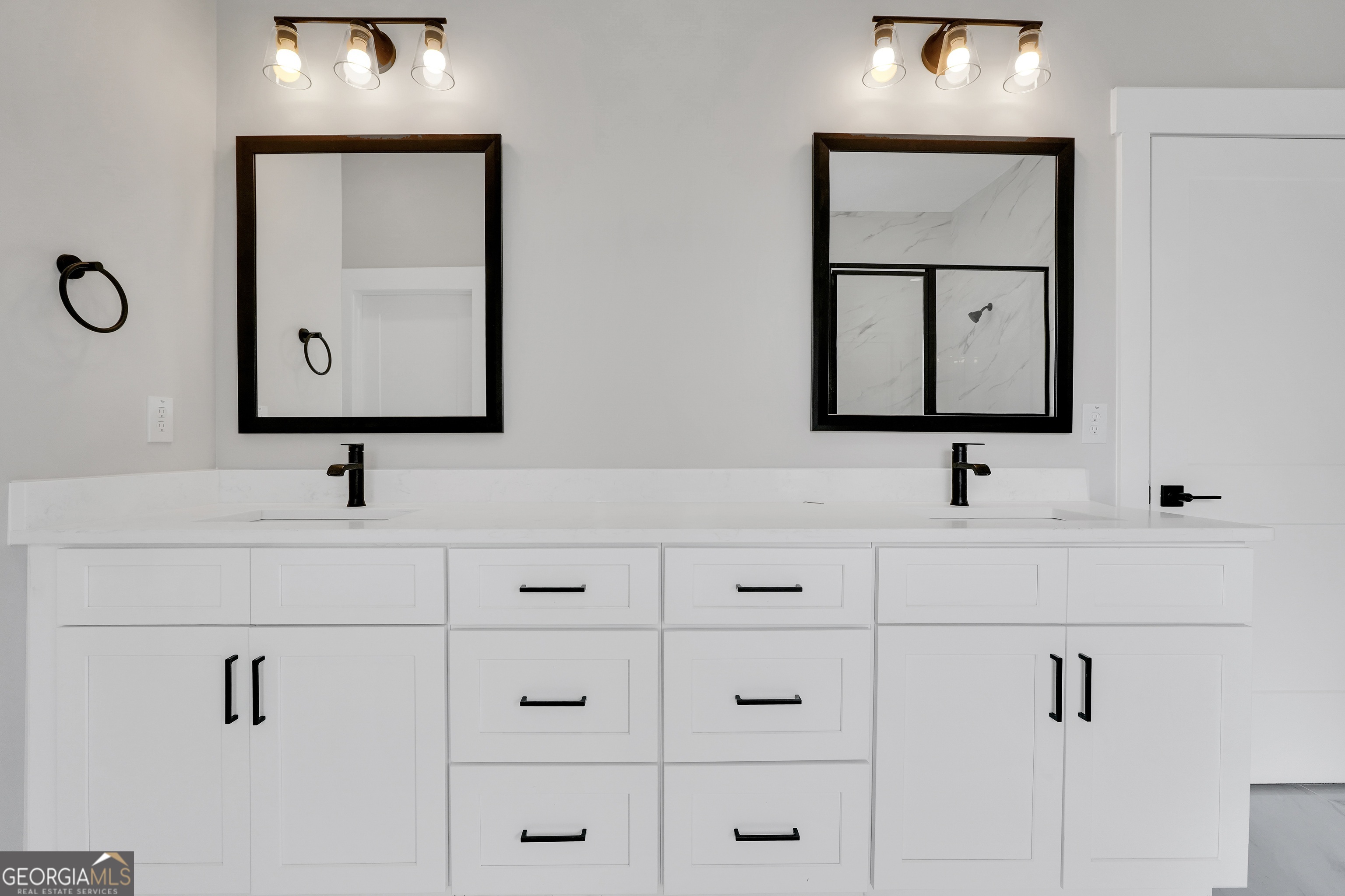 267 East Knight Road McDonough, GA 30252 - Photo 12 of 17 a bathroom with double vanity sink and two mirror