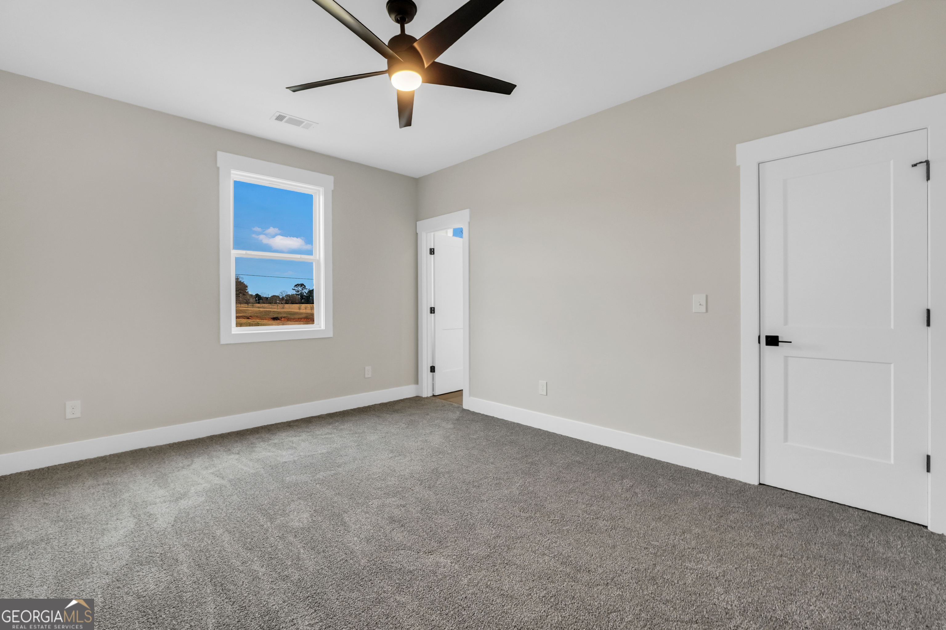 267 East Knight Road McDonough, GA 30252 - Photo 15 of 17 a view of an empty room with a window