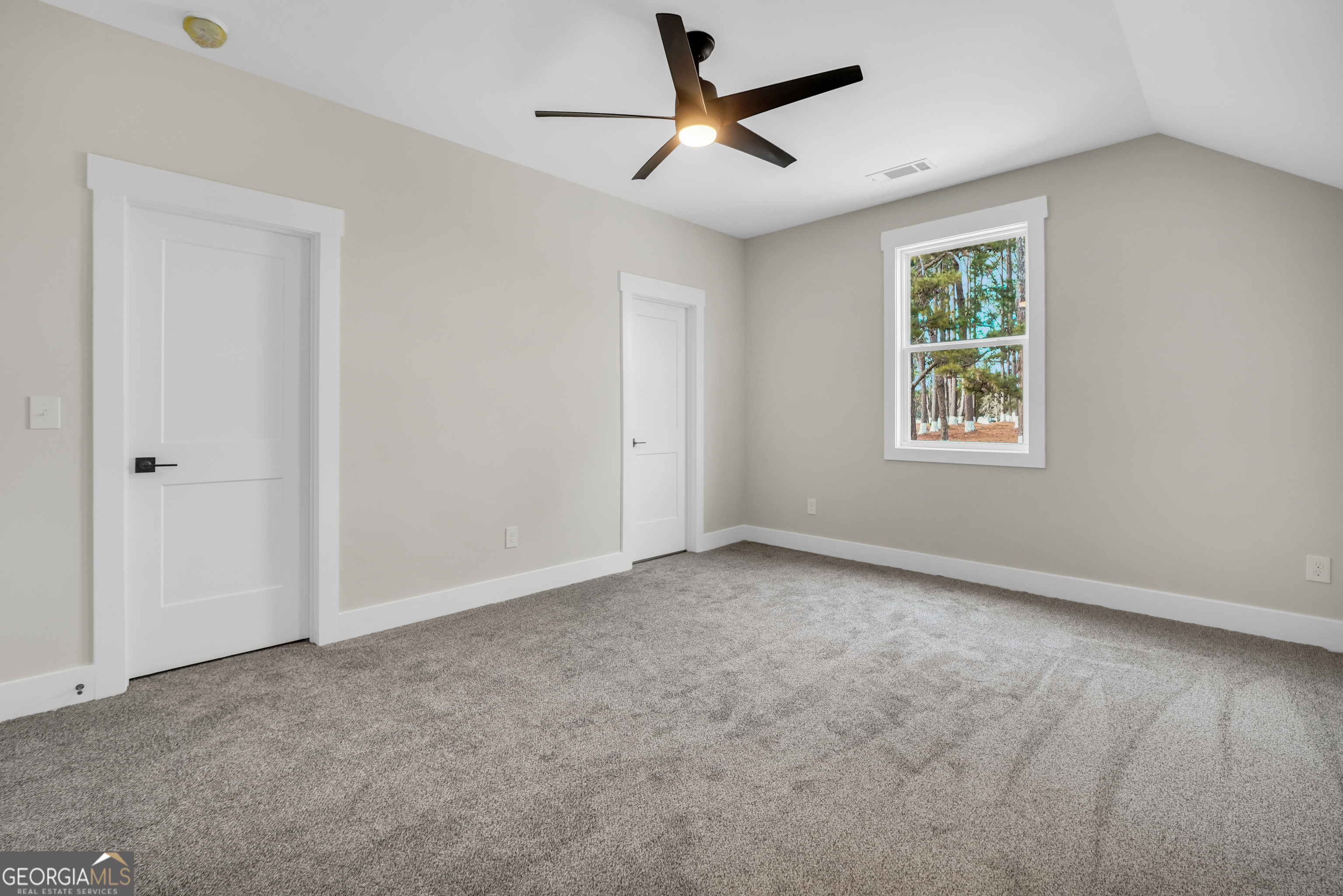 267 East Knight Road McDonough, GA 30252 - Photo 17 of 17 a view of an empty room with a window