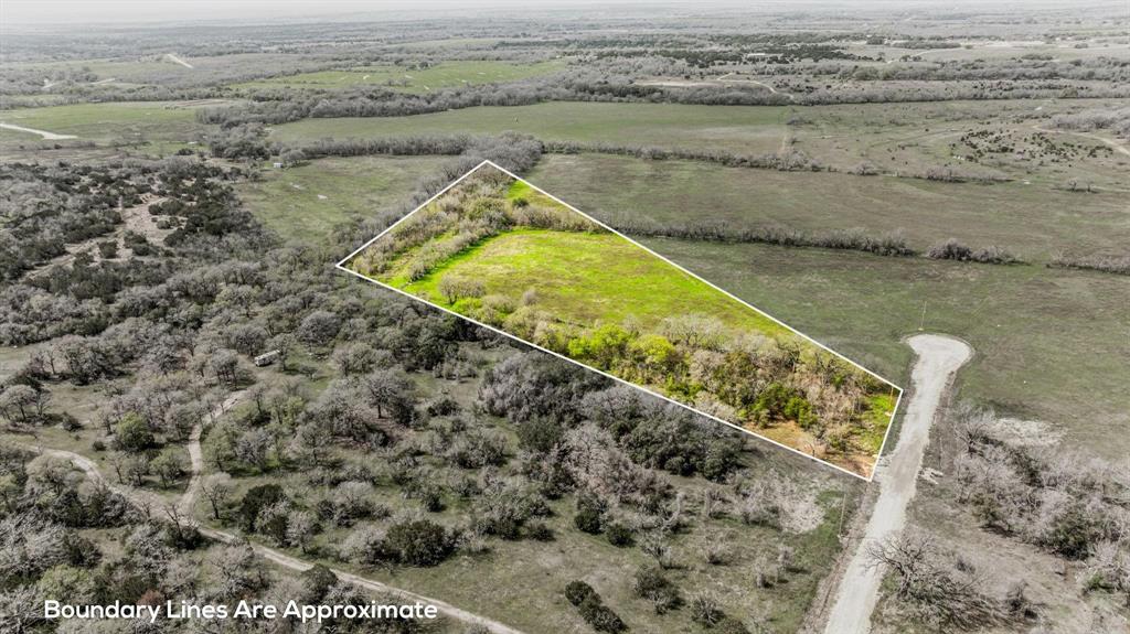 Lot 8 Ranches At Comanche Point Carlton, TX 76436 - Photo 3 of 11 a view of a lake with a mountain