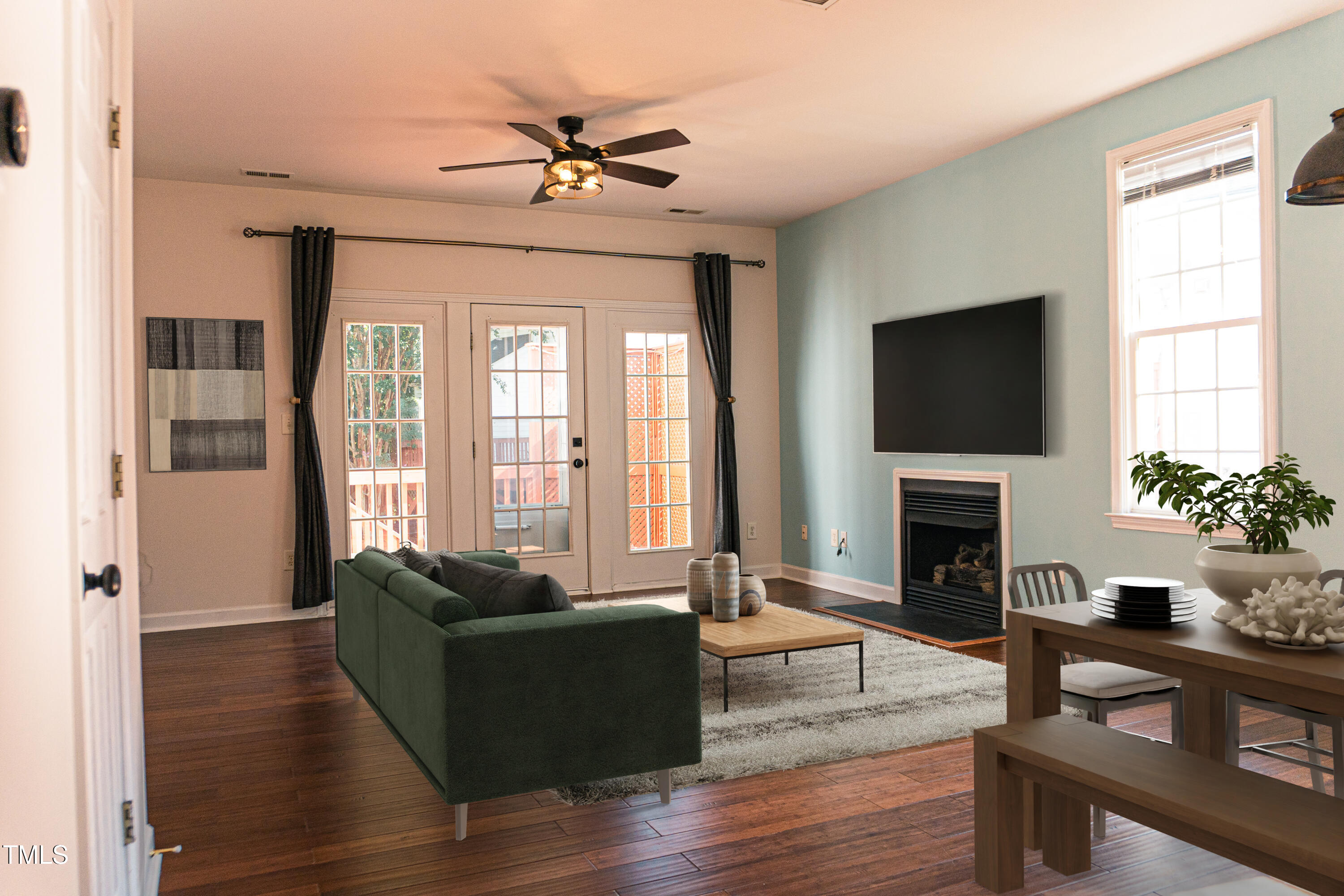 2271 Trailwood Valley Circle Raleigh, NC 27603 - Photo 10 of 36 a living room with furniture and a fireplace