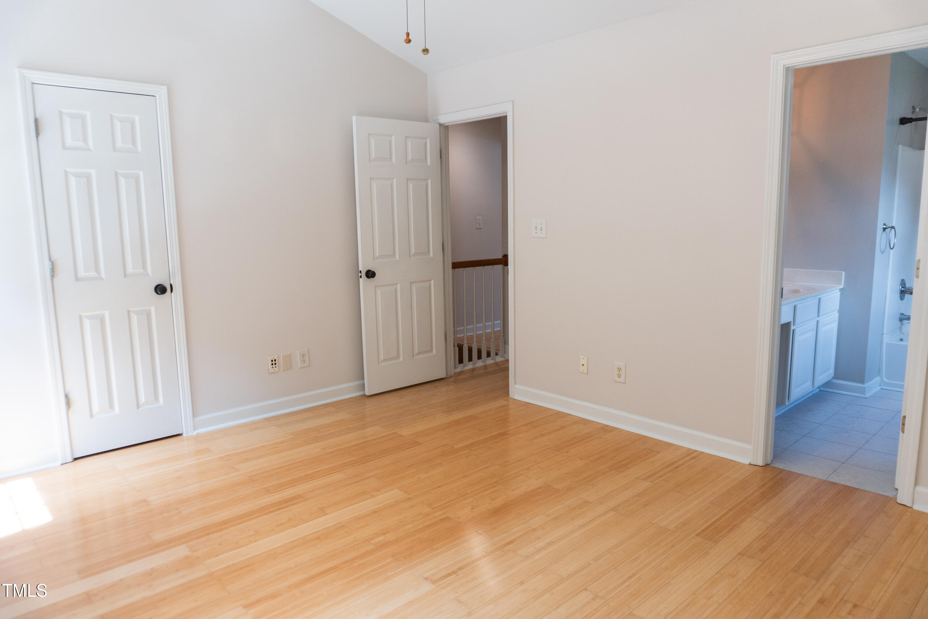 2271 Trailwood Valley Circle Raleigh, NC 27603 - Photo 22 of 36 a view of an empty room with wooden floor