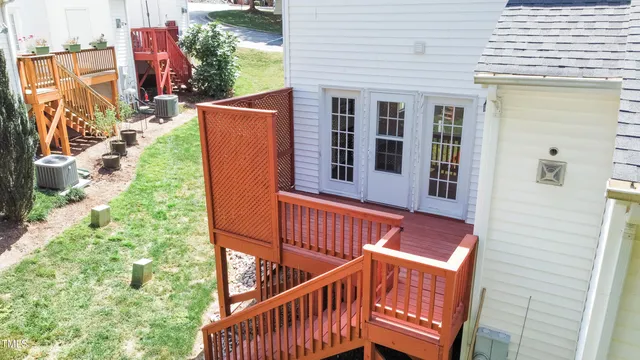 a view of a balcony with furniture