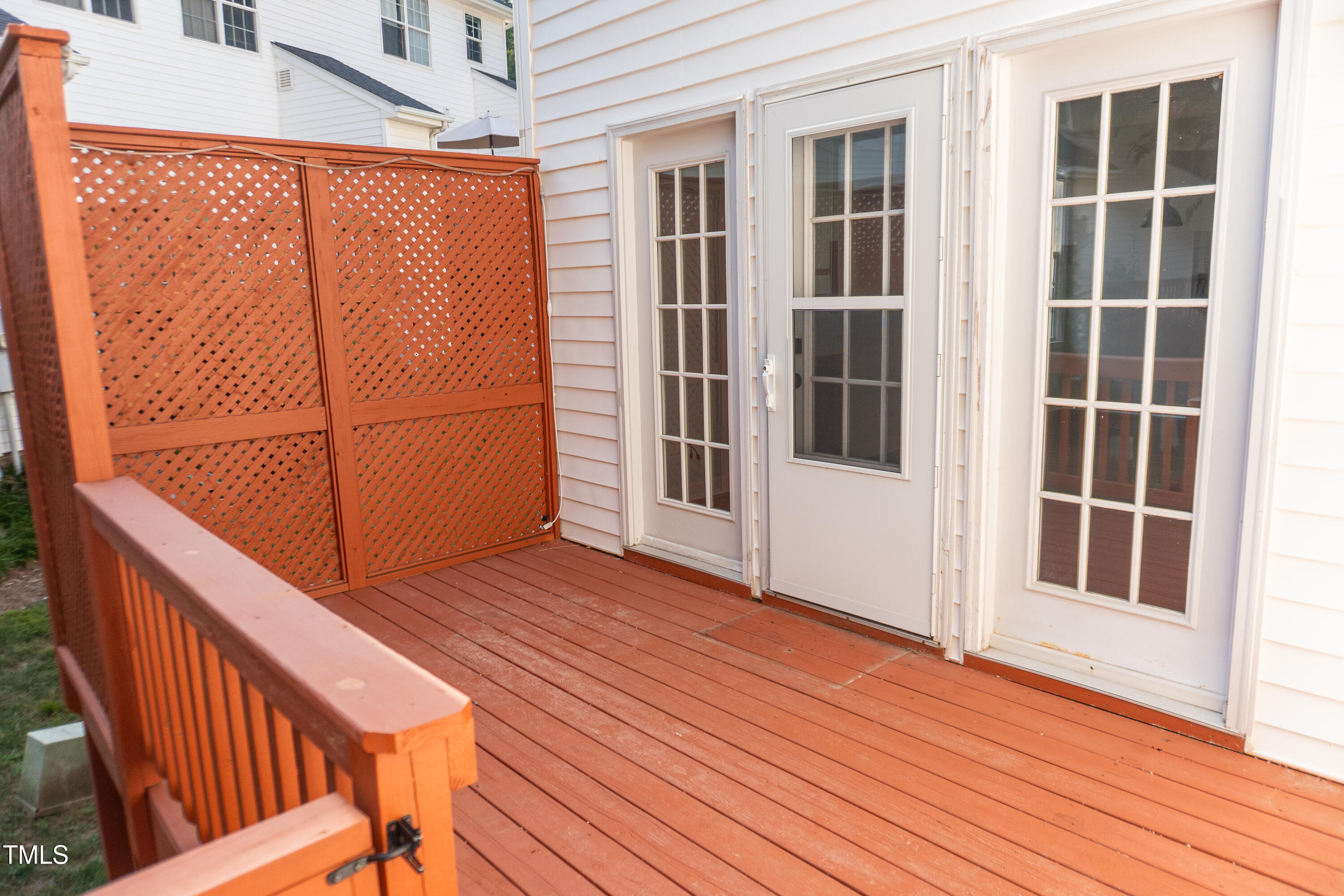 2271 Trailwood Valley Circle Raleigh, NC 27603 - Photo 33 of 36 a view of balcony with wooden floor and fence