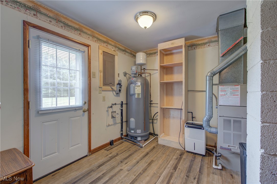 14808 Wheeler Road Lagrange, OH 44050 - Photo 20 of 50 Utilities with water heater, electric panel, and heating unit