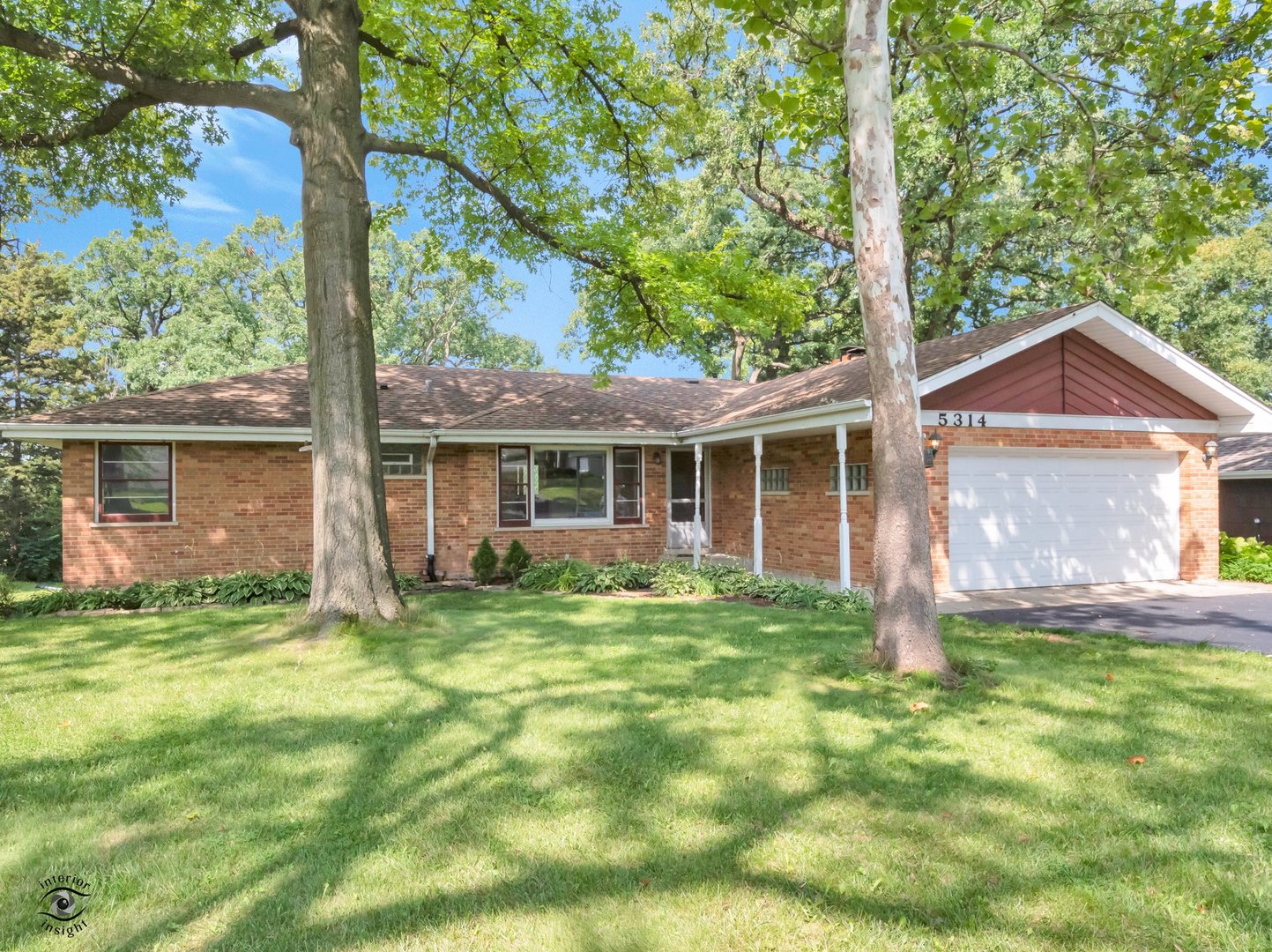 5314 Oakview Drive Lisle, IL 60532 - Photo 1 of 24 a view of a house with a yard and sitting area