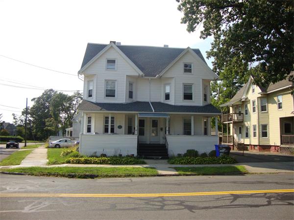 26-28 Pasco Road Springfield, MA 01151 - Photo 2 of 4 a front view of a house with a yard