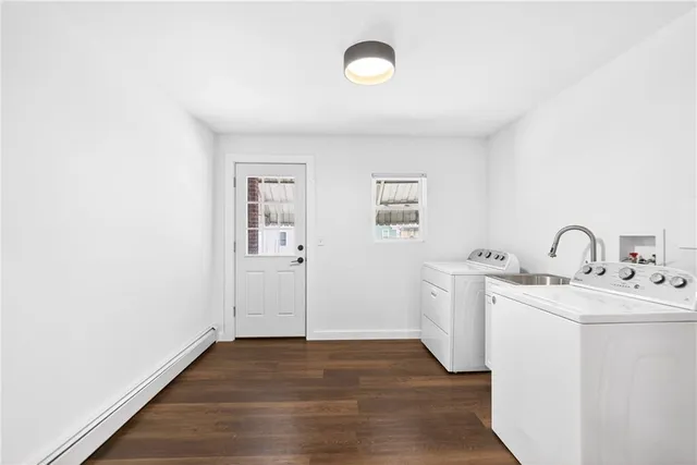 a utility room with dryer and washer