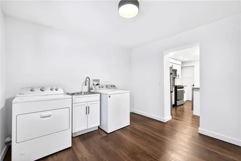 a utility room with dryer and washer