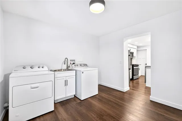 a utility room with dryer and washer
