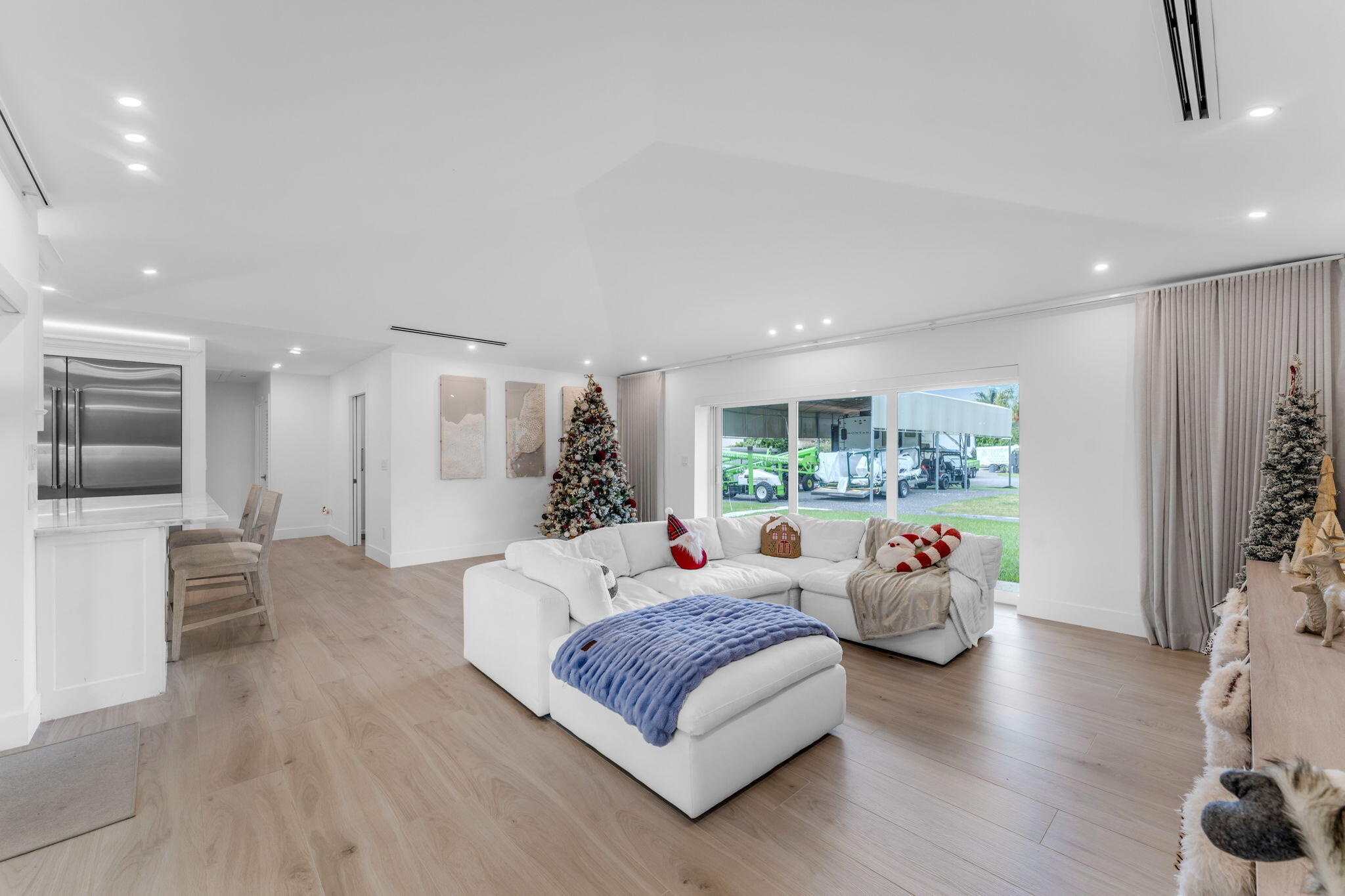 16941 Southwest 278th Street Homestead, FL 33031 - Photo 13 of 44 a living room with furniture and a large window