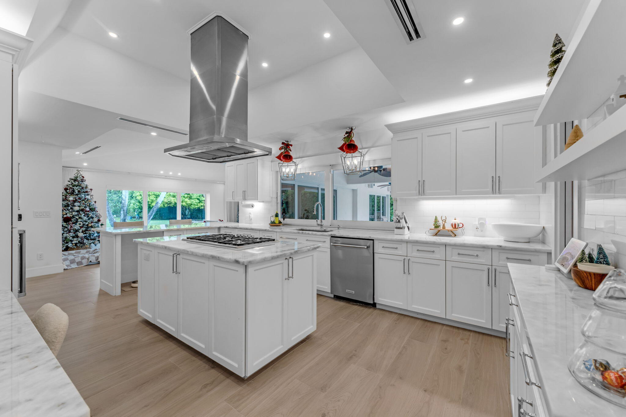 16941 Southwest 278th Street Homestead, FL 33031 - Photo 17 of 44 a kitchen with stove a sink and cabinets