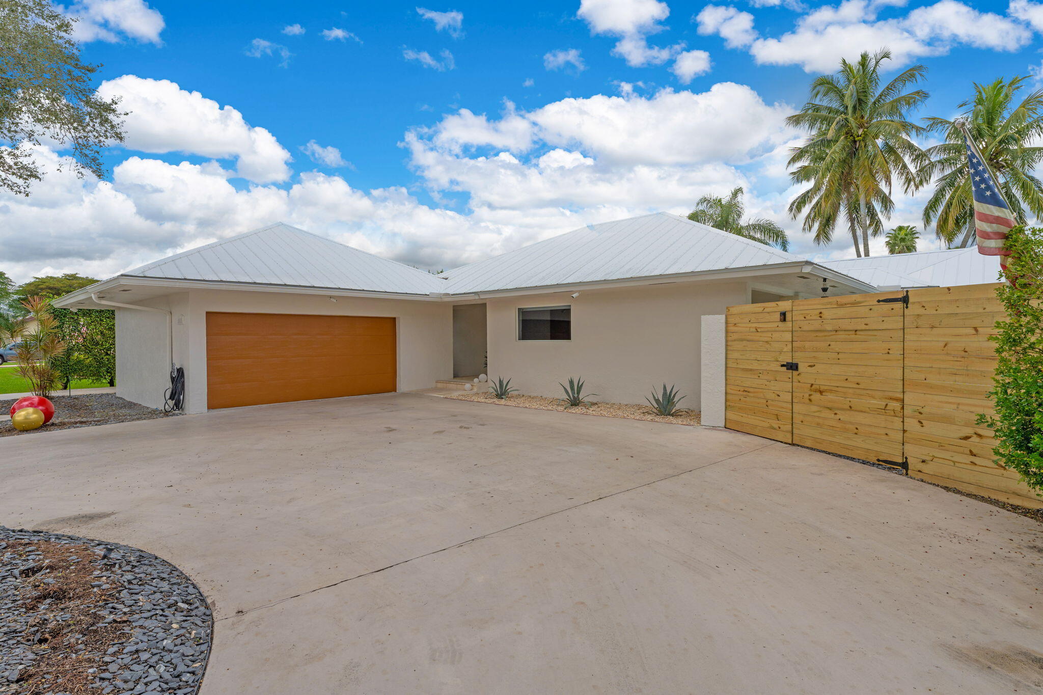 16941 Southwest 278th Street Homestead, FL 33031 - Photo 19 of 44 a view of a house with a yard and garage