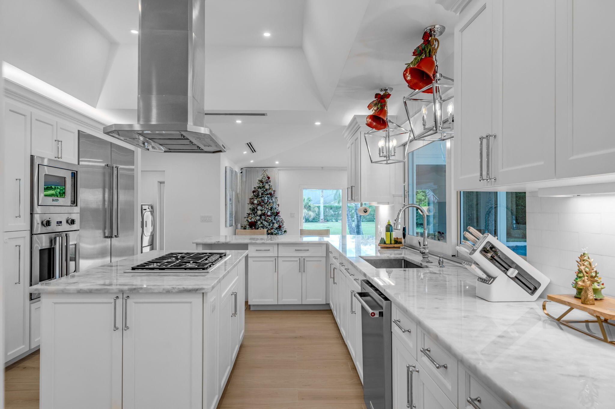 16941 Southwest 278th Street Homestead, FL 33031 - Photo 20 of 44 a kitchen with stainless steel appliances granite countertop a sink stove and cabinets