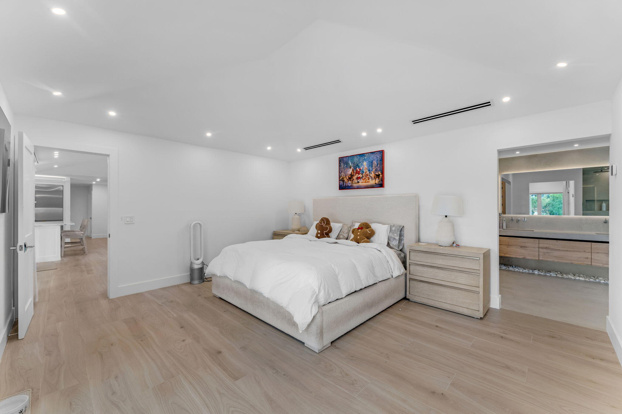 16941 Southwest 278th Street Homestead, FL 33031 - Photo 30 of 44 a bedroom with a bed and a painting