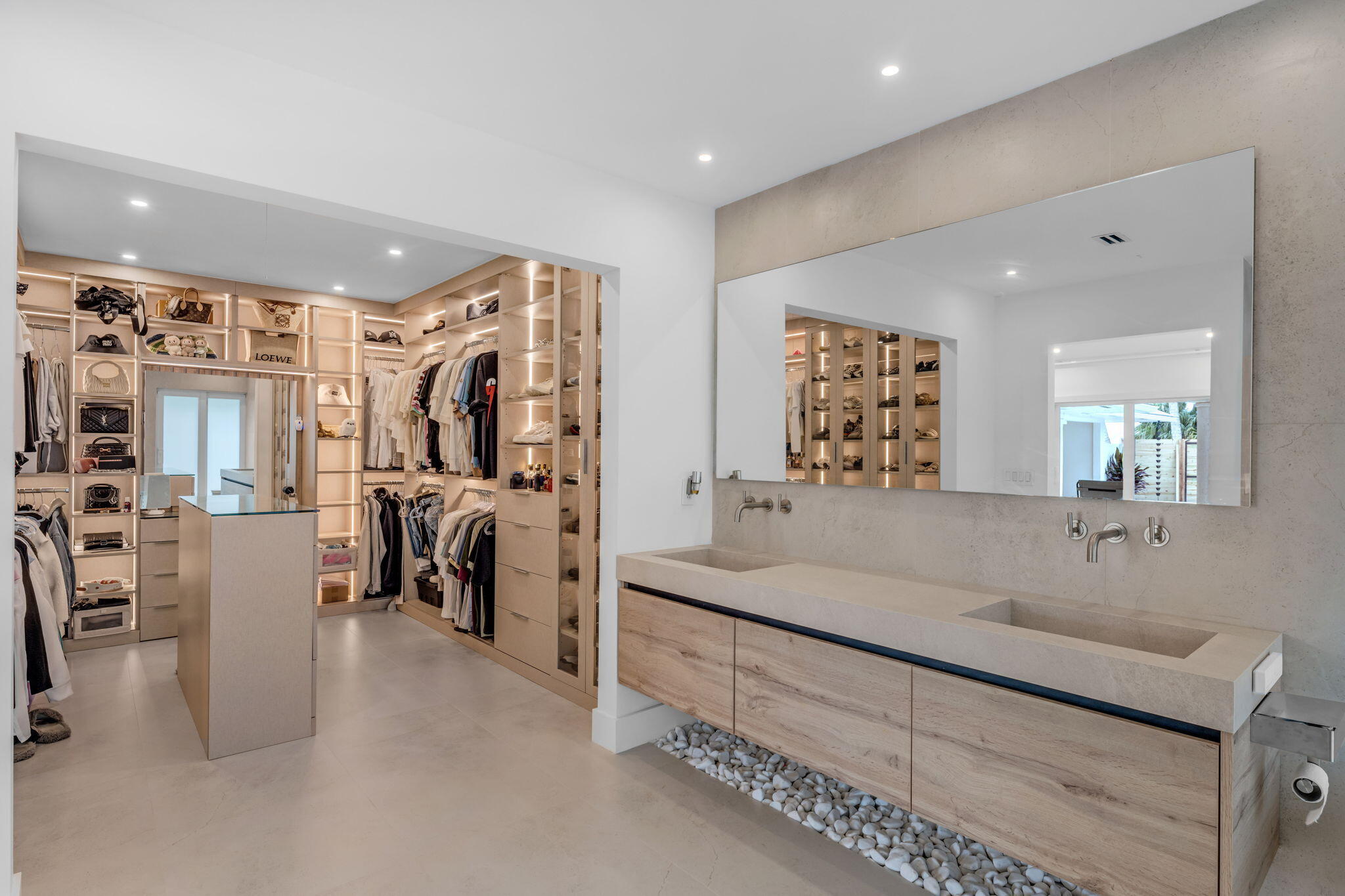 16941 Southwest 278th Street Homestead, FL 33031 - Photo 34 of 44 a spacious bathroom with a double vanity sink and a mirror