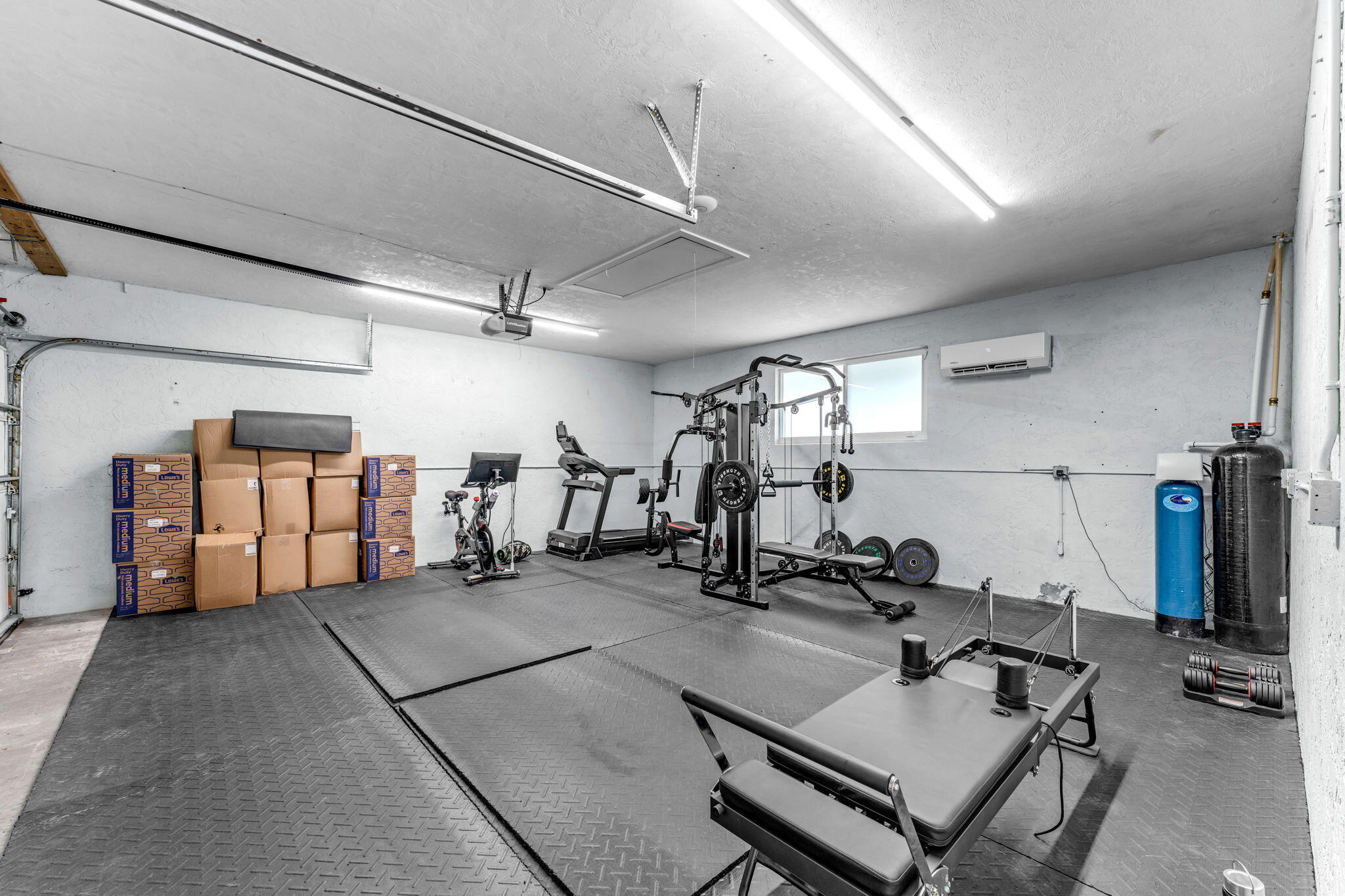 16941 Southwest 278th Street Homestead, FL 33031 - Photo 40 of 44 a view of a gym with equipment