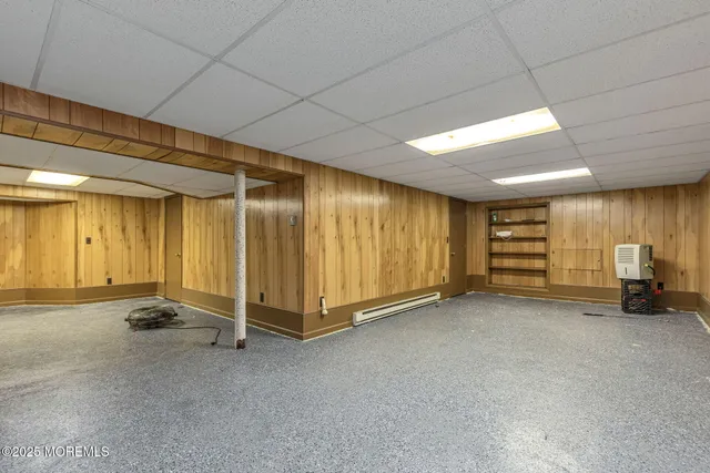 a view of an empty room with stairs
