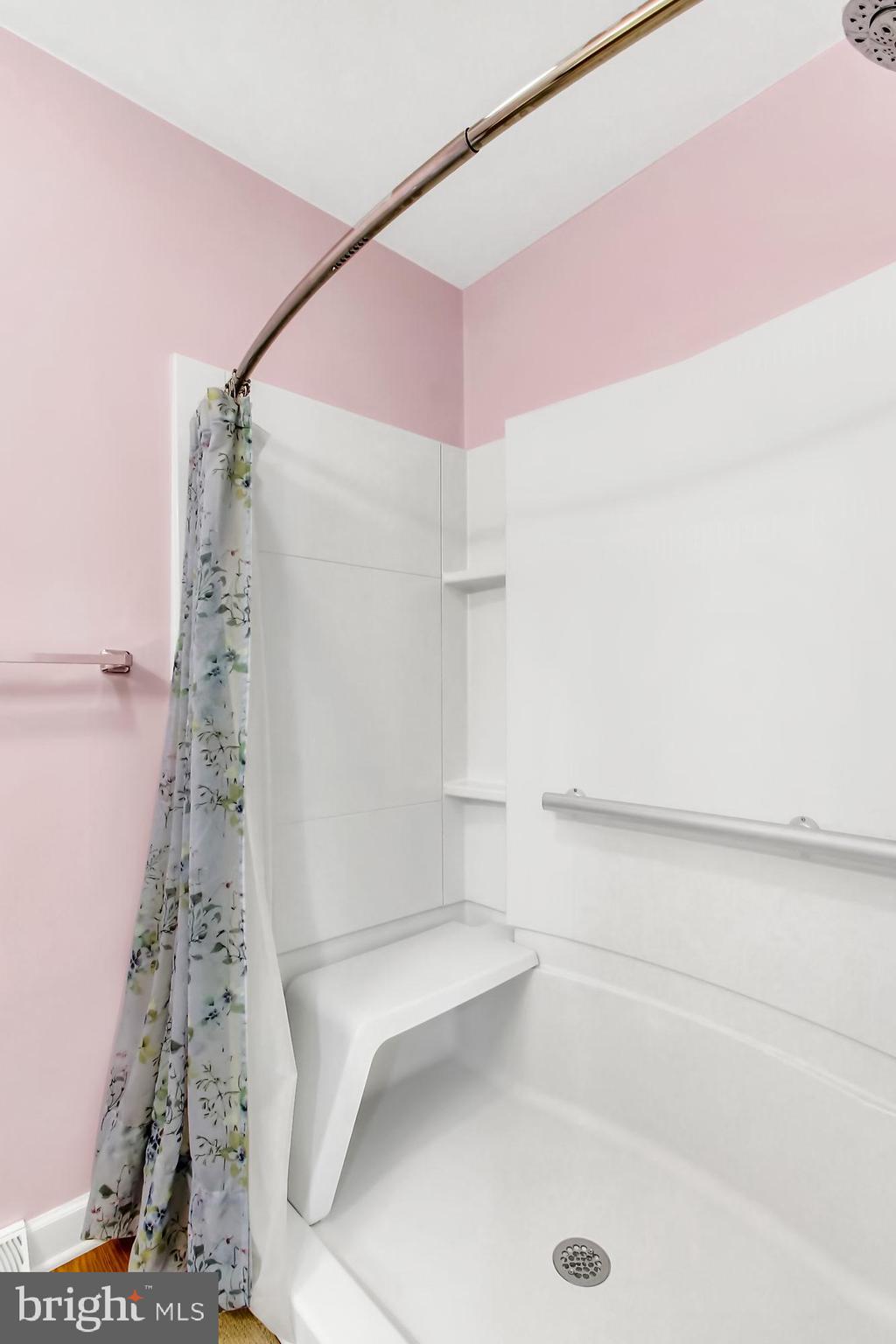 411 Devon Road York, PA 17403 - Photo 14 of 44 Low step in shower with built in seat in guest roo