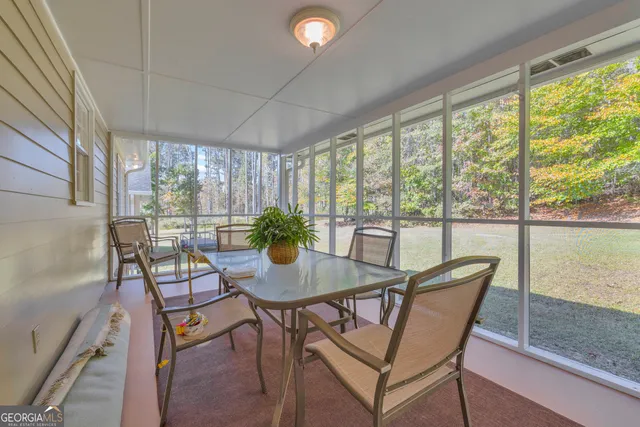 a view of a outdoor seating area with furniture