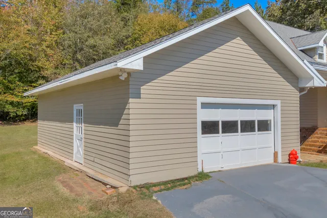a view of a house with a garage