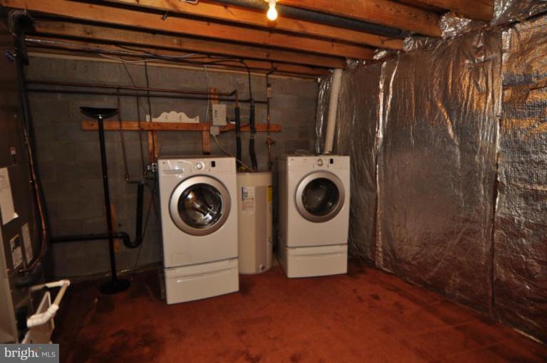 10902 Harpers Square Court Reston, VA 20191 - Photo 12 of 19 a utility room with dryer and washer