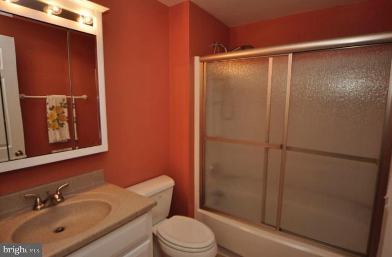 10902 Harpers Square Court Reston, VA 20191 - Photo 18 of 19 a bathroom with a sink toilet and shower