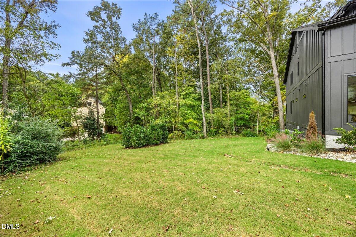 5406 Garrett Road Durham, NC 27707 - Photo 64 of 80 side yard