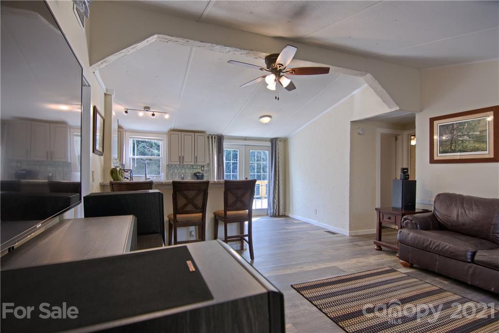 73 Church Road Fairview, NC 28730 - Photo 11 of 45 a living room with furniture and a view of kitchen