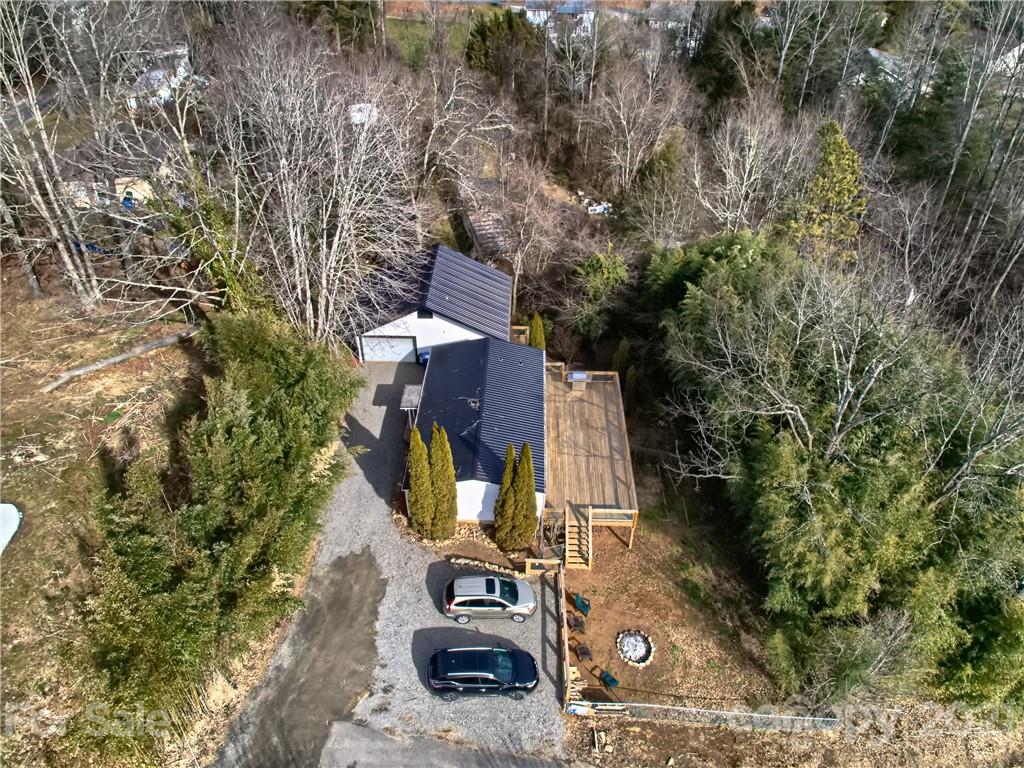 73 Church Road Fairview, NC 28730 - Photo 32 of 45 front view of a house with trees