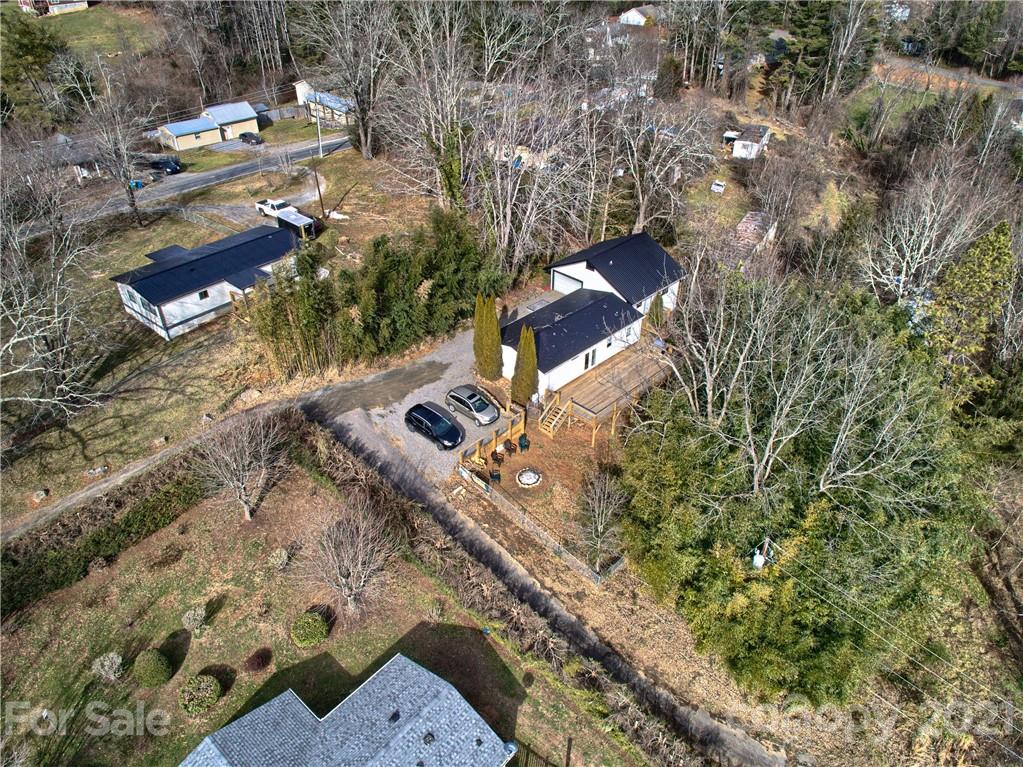 73 Church Road Fairview, NC 28730 - Photo 34 of 45 an aerial view of a house with a yard