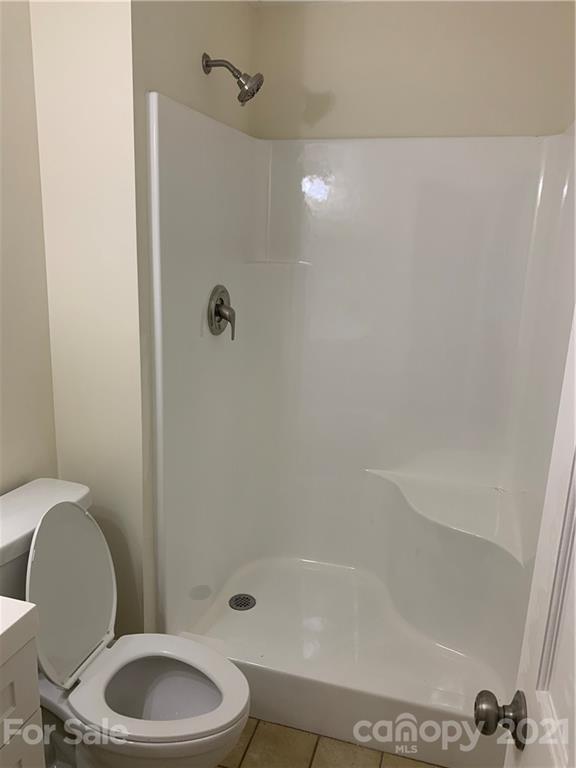 73 Church Road Fairview, NC 28730 - Photo 43 of 45 a bathroom with a toilet and a shower