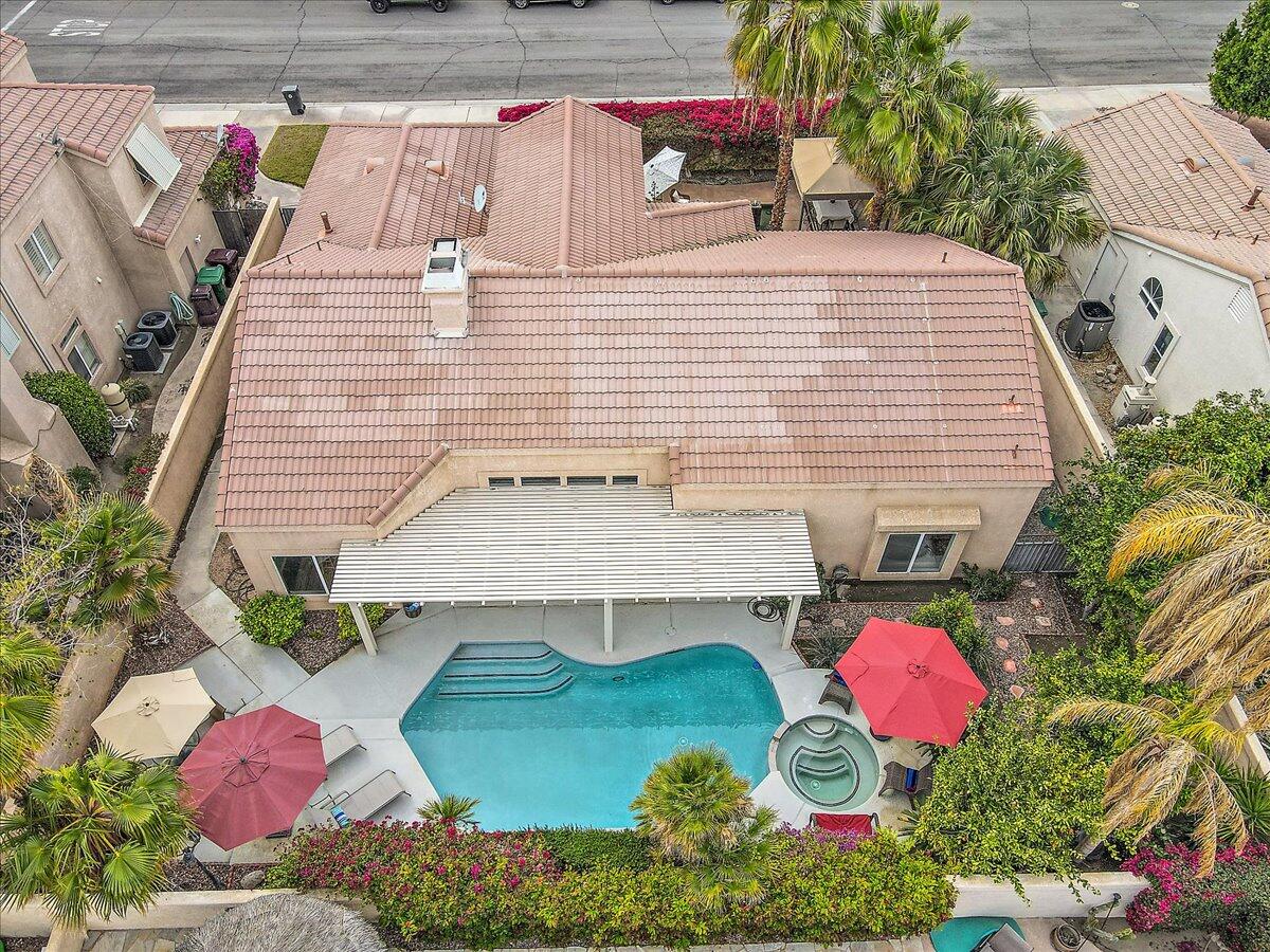 45510 Desert Fox Drive La Quinta, CA 92253 - Photo 2 of 49 a backyard of a house with outdoor seating
