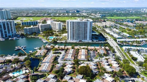 a view of a city and lake