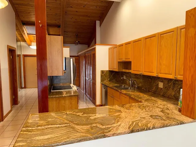 a view of a living room with furniture