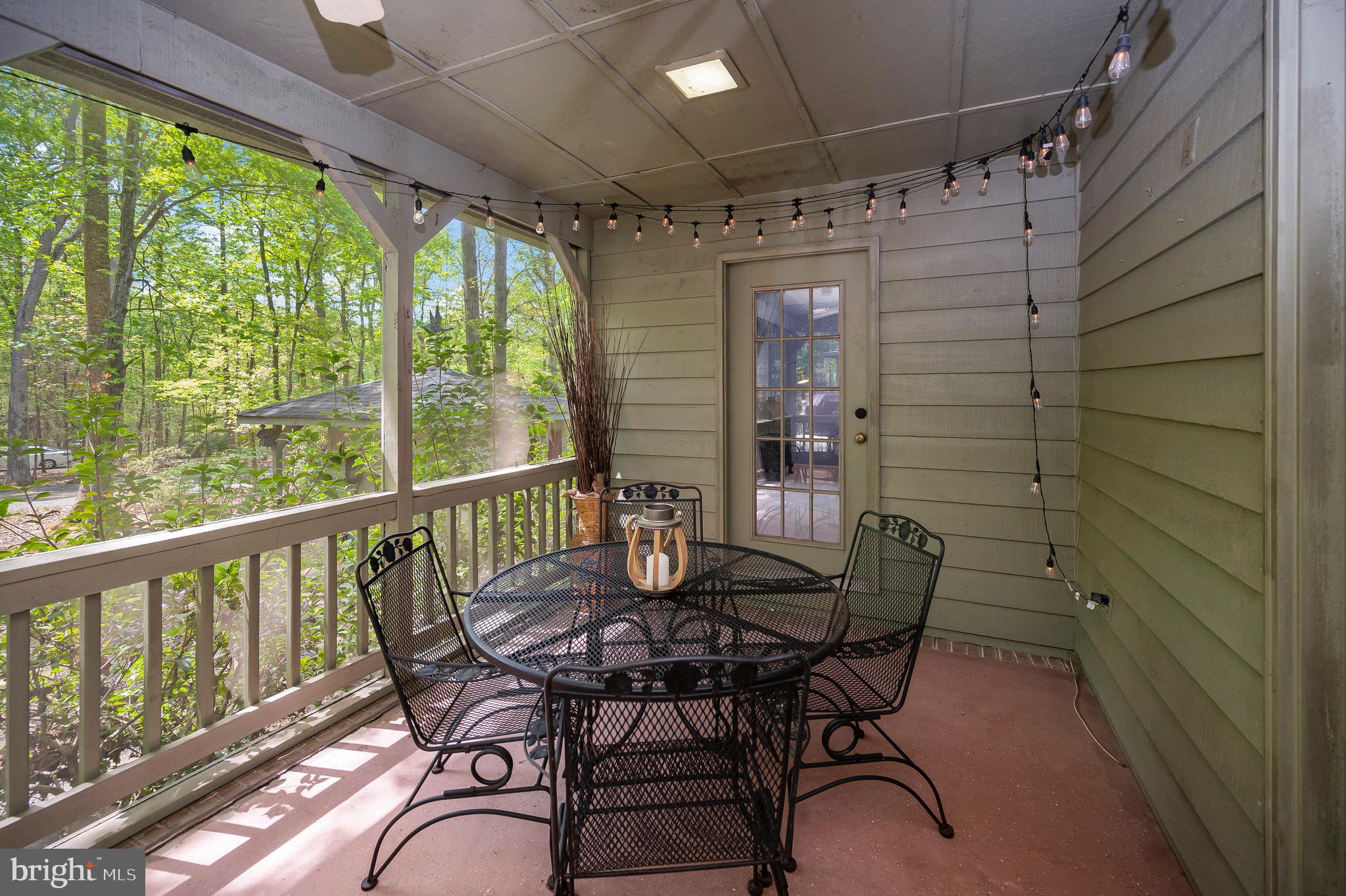 302 Gold Valley Road Locust Grove, VA 22508 - Photo 10 of 48 Screened porch is an extension of the home